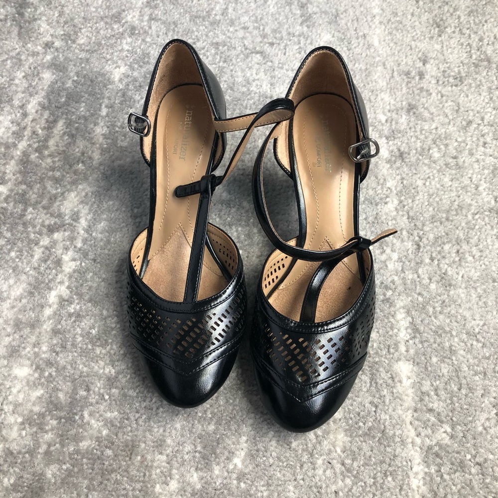 T-strap black heels with perforated detail